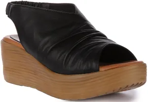 Justinreess England Dilla Wedge Sandal In Black For Women